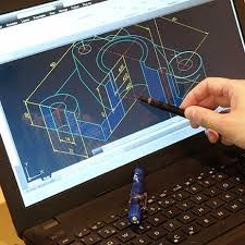 person reviewing CAD drawing on computer